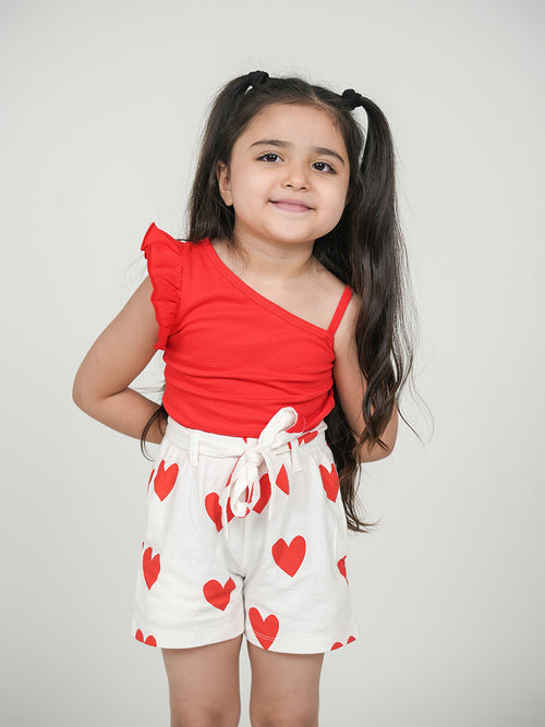 Girls One Shoulder Ruffle Trim Top & Heart Print Belted Shorts Set